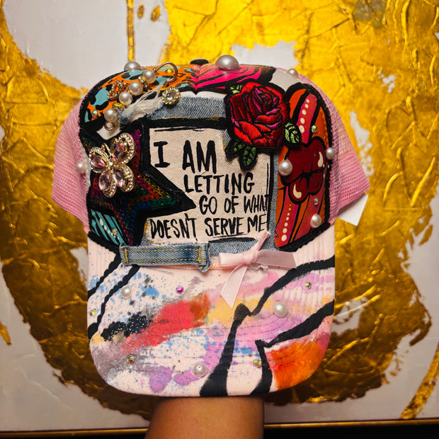 I Am Letting Go Of What Doesn’t Serve Me Trucker Hat